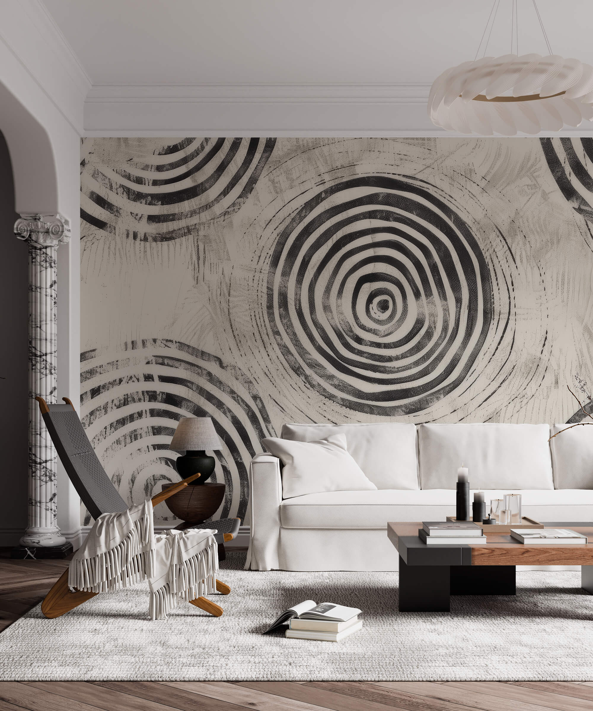 papier peint abstrait cercles noir et blanc avec un canapé blanc 